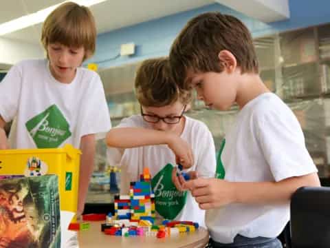 a group of kids playing with toys