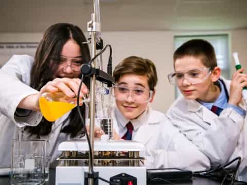 a group of people in lab coats