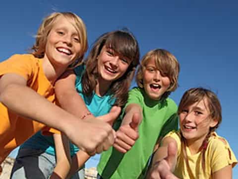 a group of girls smiling