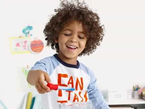 a child holding a toy