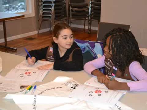 a few young girls studying