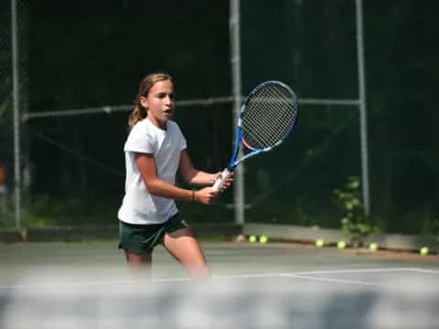 a woman playing tennis