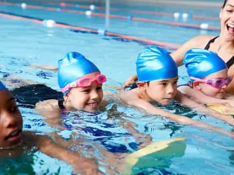 a group of people in a pool