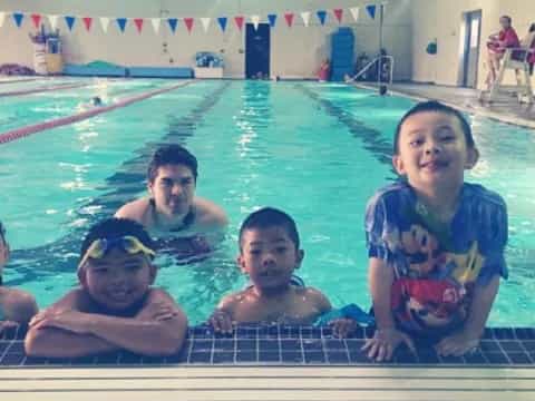 a group of people in a pool