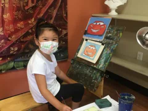 a child with a mask