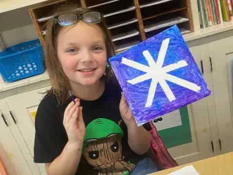 a girl holding a flag