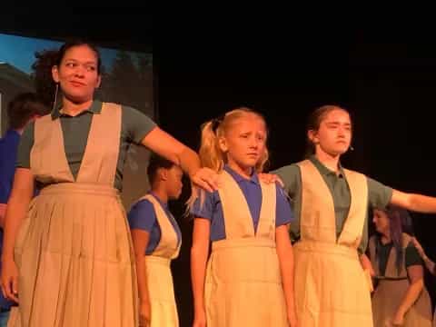 a group of children in clothing