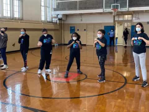 a group of girls in a gym