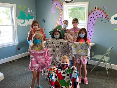 a group of children in clothing