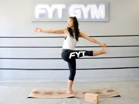a woman doing yoga