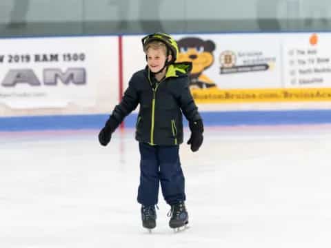 a child on an ice rink