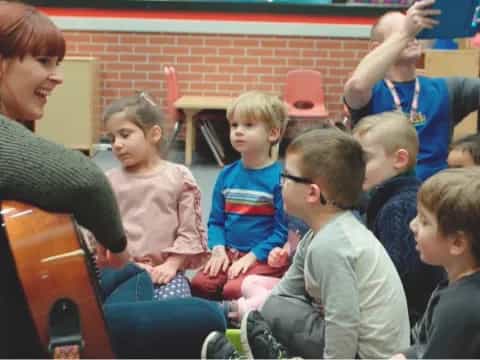 a person and a group of children