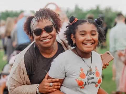 a man and a woman smiling