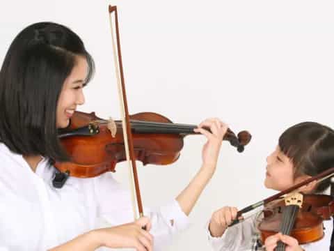 a person playing a violin