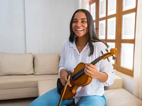 a person playing a guitar