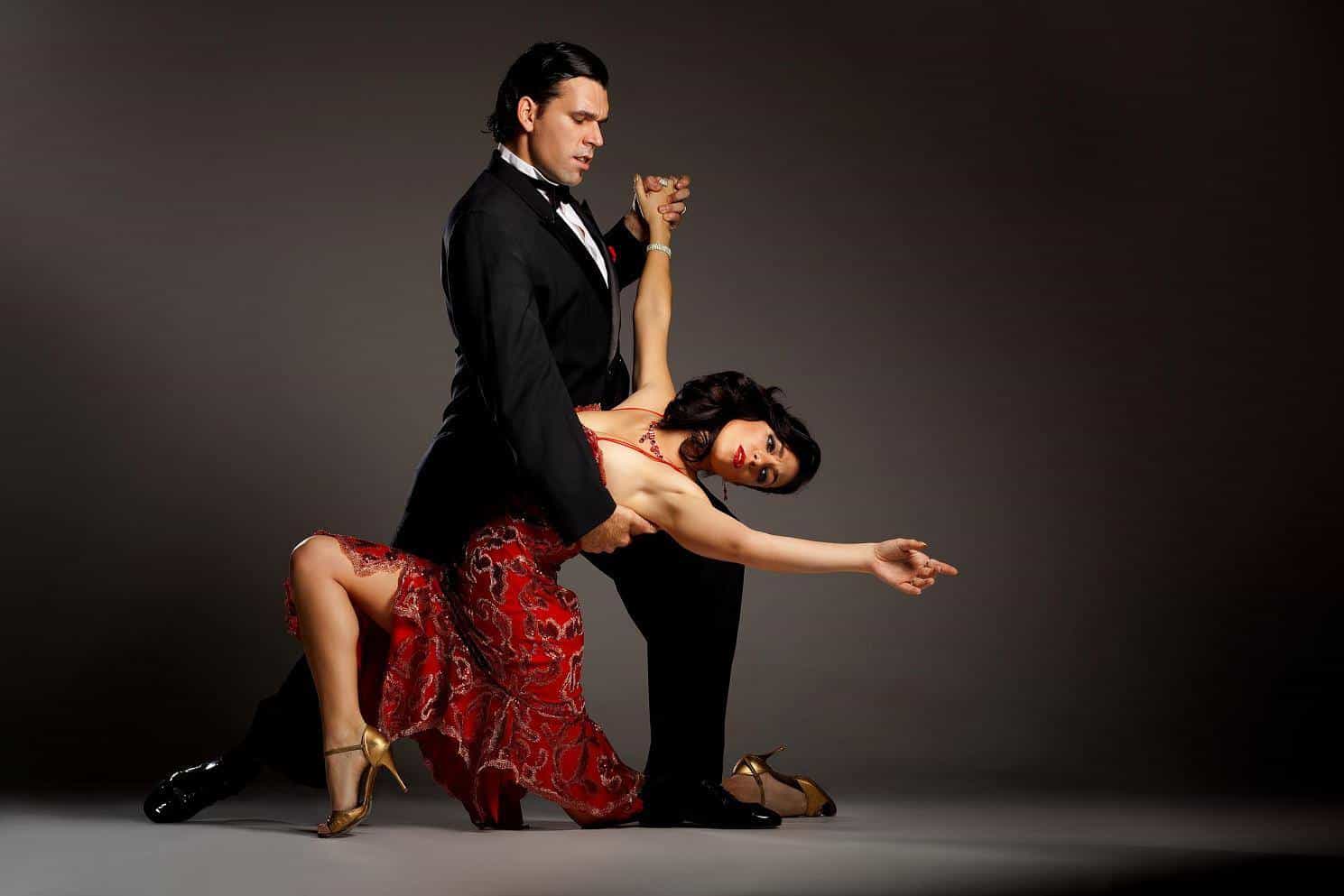 a man and woman dancing