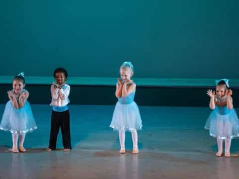 a group of children on a stage