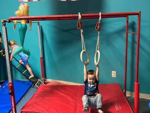 a boy on a swing set