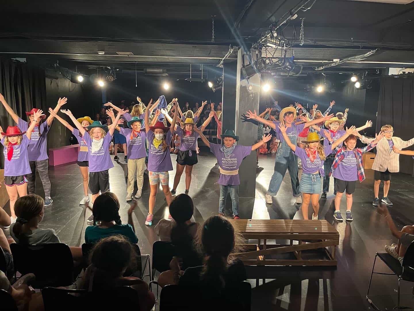 a group of people performing on stage