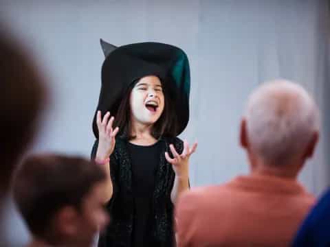 a person wearing a graduation cap