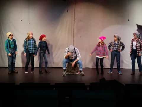 a group of people on a stage