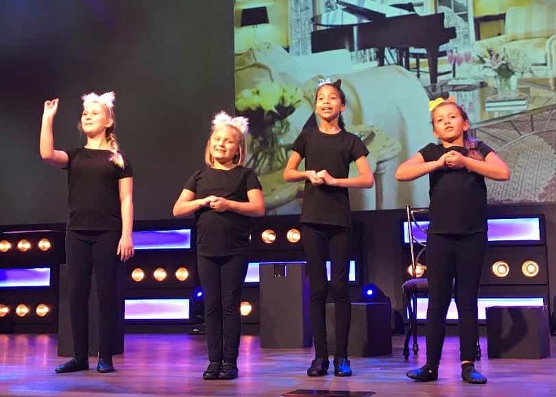 a group of people on a stage