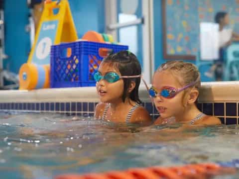 two girls in a pool