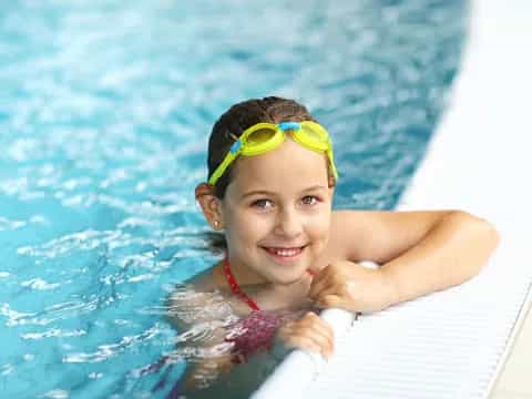 a boy in a pool
