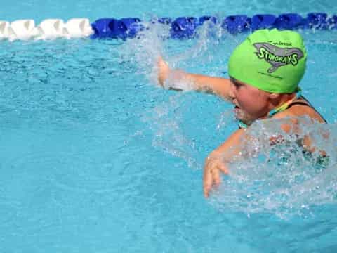 a person swimming in a pool