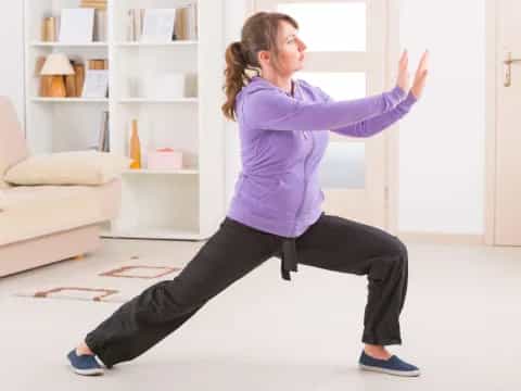 a woman stretching her leg