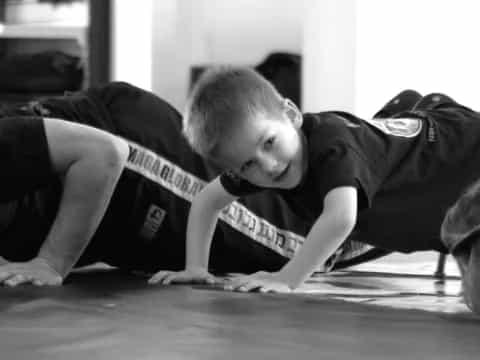 a boy lying on the floor