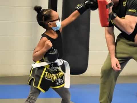 a man and woman in a boxing ring