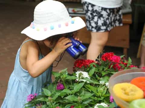 a girl holding a camera