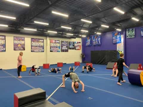 a group of people in a gym