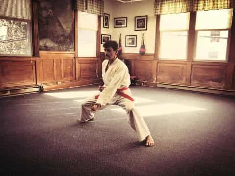 a person in a karate uniform