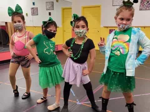 a group of girls wearing clothing