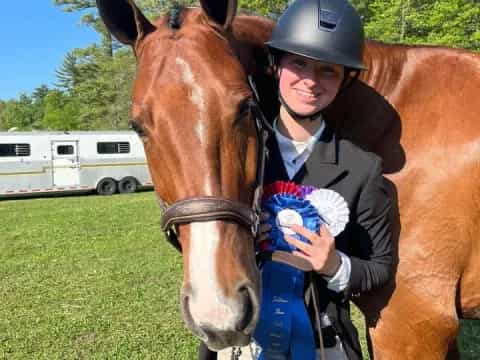 a man holding a horse