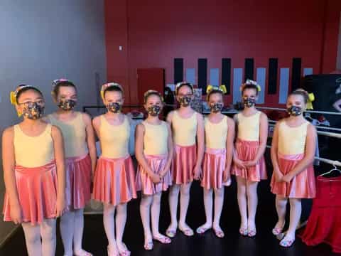 a group of women wearing clothing