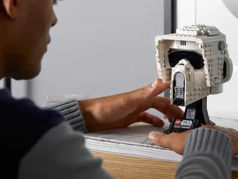a person using a microscope