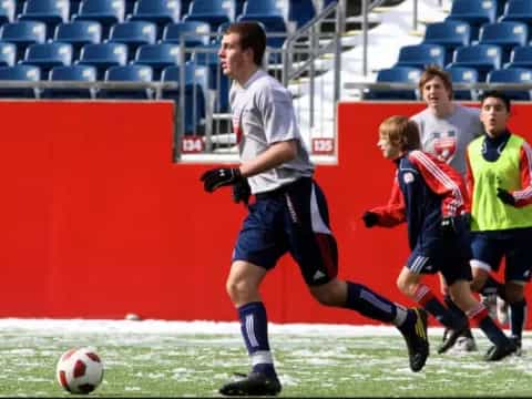 a group of men playing football