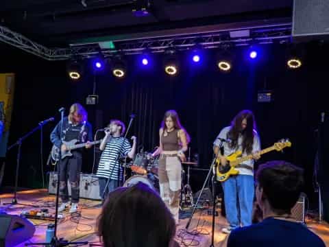 a group of people on a stage