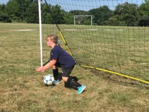 a girl playing football
