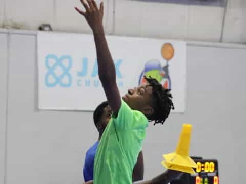 a person raising the hand