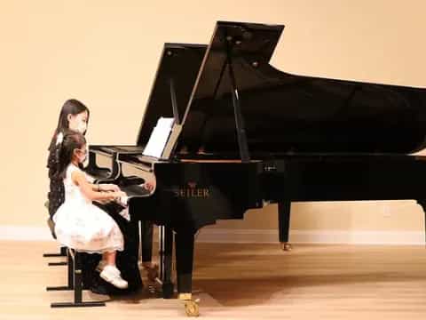a person playing a piano