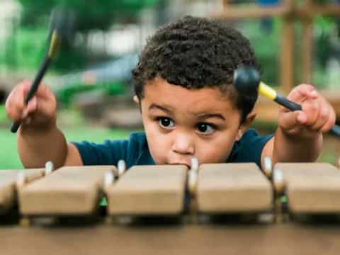 a boy with a hammer