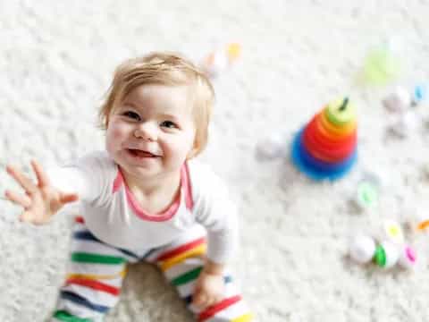 a baby with a toy