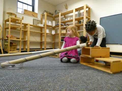 a few children playing with a toy
