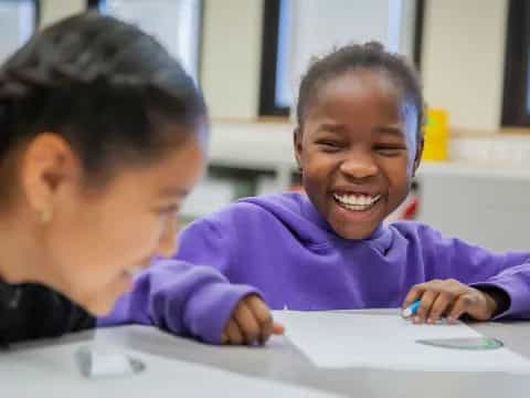 a person and a child smiling