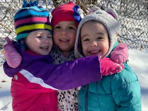 a group of children smiling
