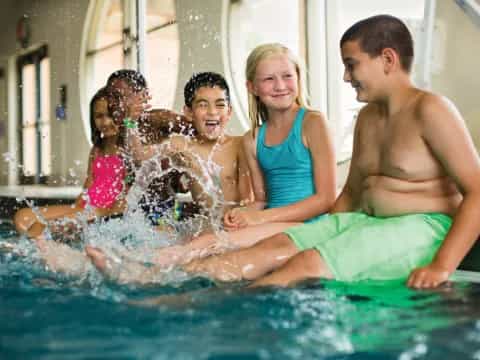 a group of people in a pool